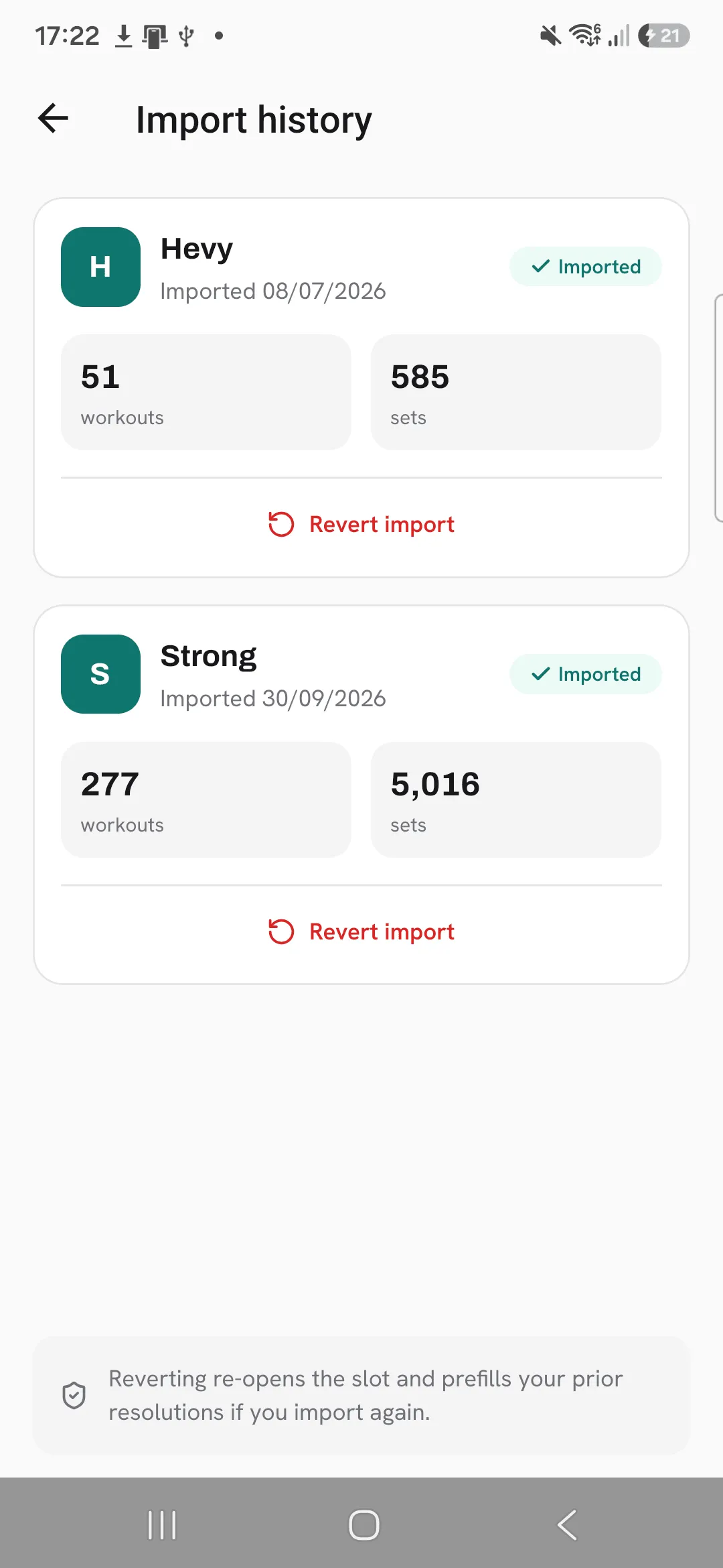 The Import history screen with a Hevy card marked Imported, showing 51 workouts and 585 sets brought over, above a Strong card.