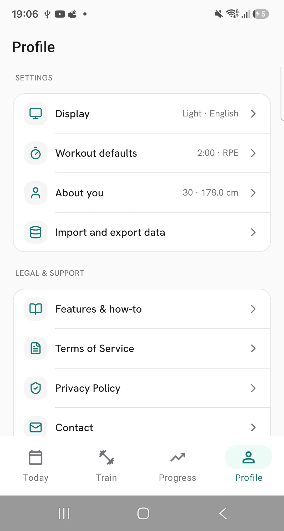 The Profile screen's settings list with Display, Workout defaults, About you and Import and export data.