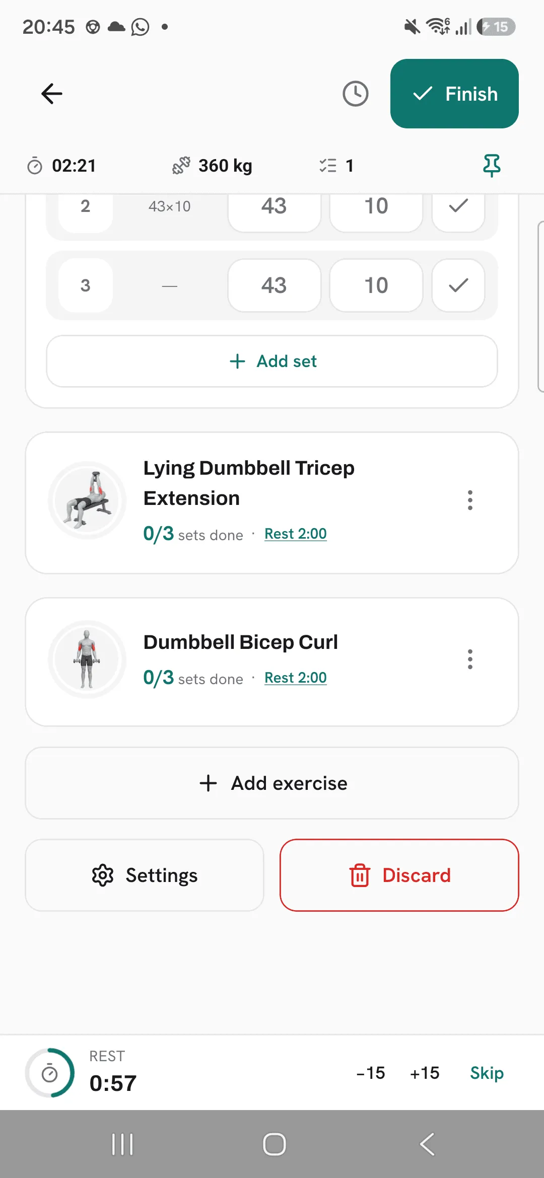 The bottom of a running workout, with the Settings button under Add exercise, next to Discard. Settings opens Workout defaults.