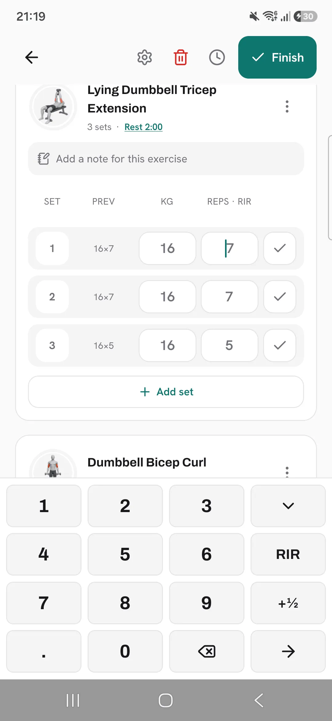 The logging keypad open on a set’s reps, with the RIR key that switches the keypad to ratings.