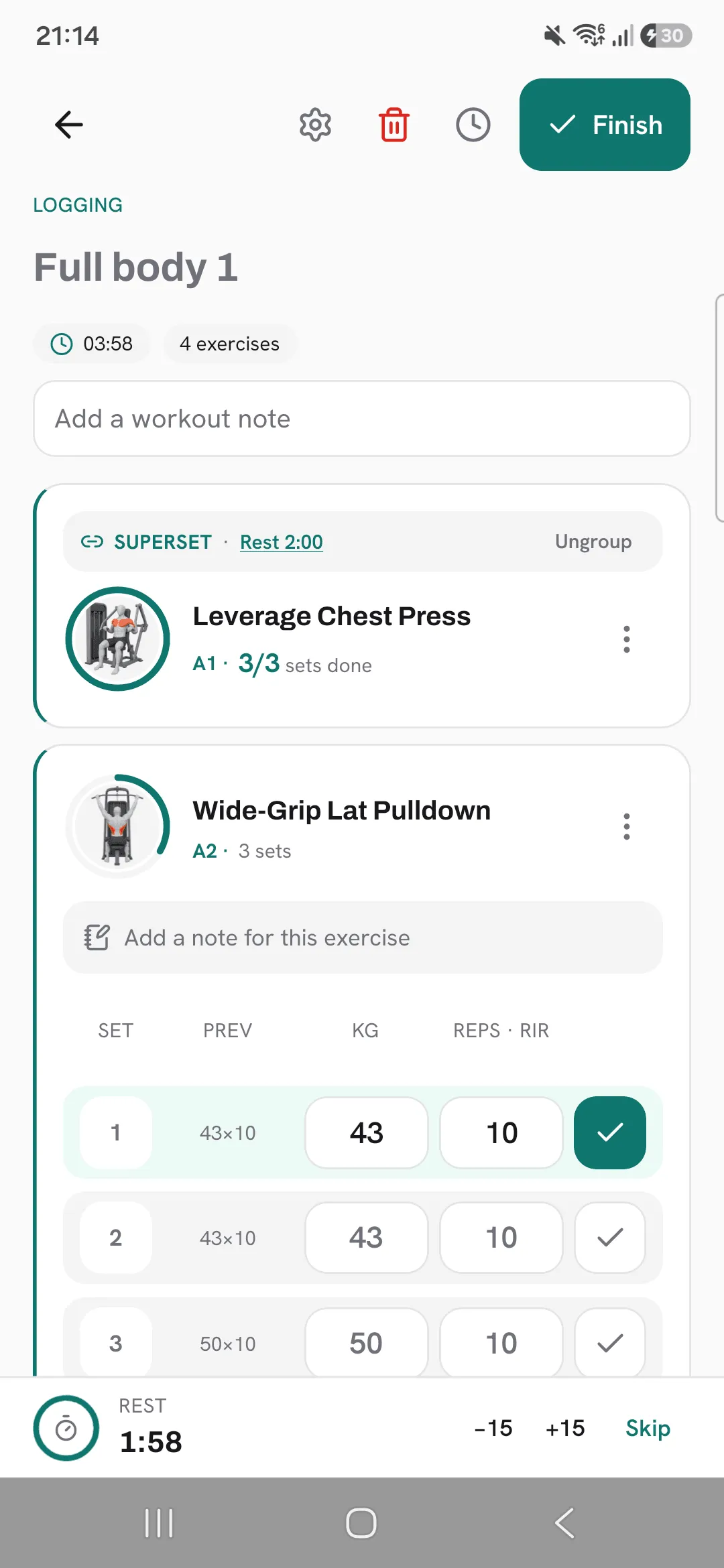 Leverage Chest Press (A1) and Wide-Grip Lat Pulldown (A2) in a superset, with a set of A2 ticked and the rest counting down at the bottom.