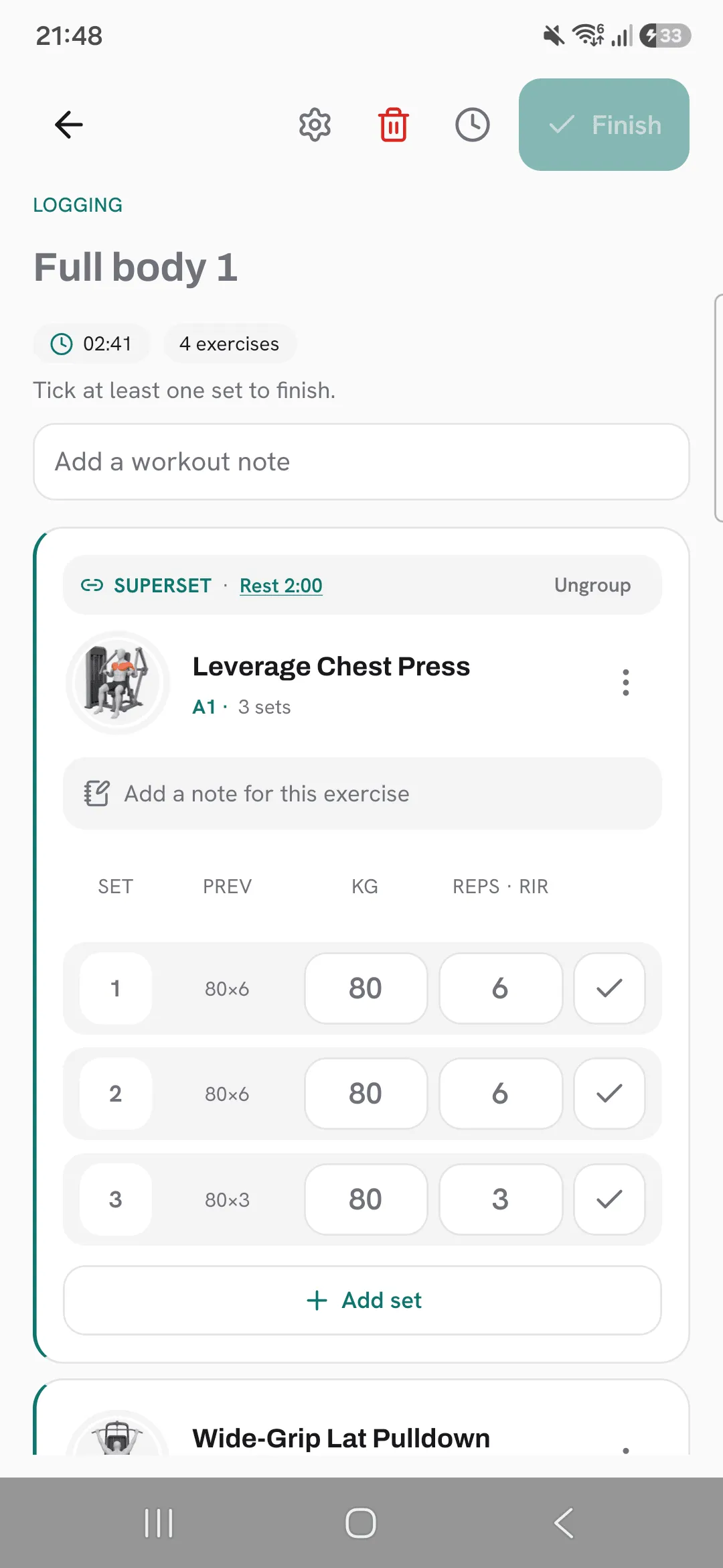 A superset header in an active workout with the superset’s Rest 2:00 link.